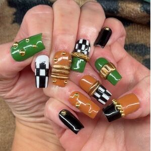 Green and Brown Nail Art with Gold Accents